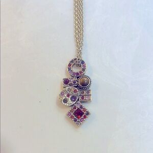 Gold “Aerilon” Patrica Locke necklace.